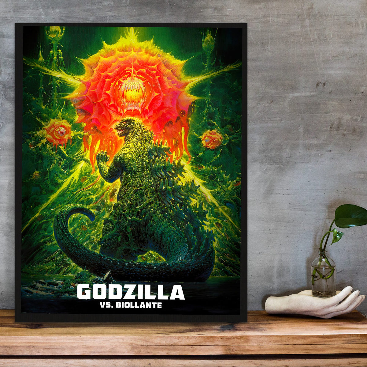 Godzilla vs. Biollante (1989) Movie Key Art poster in a black frame on a wooden shelf against concrete