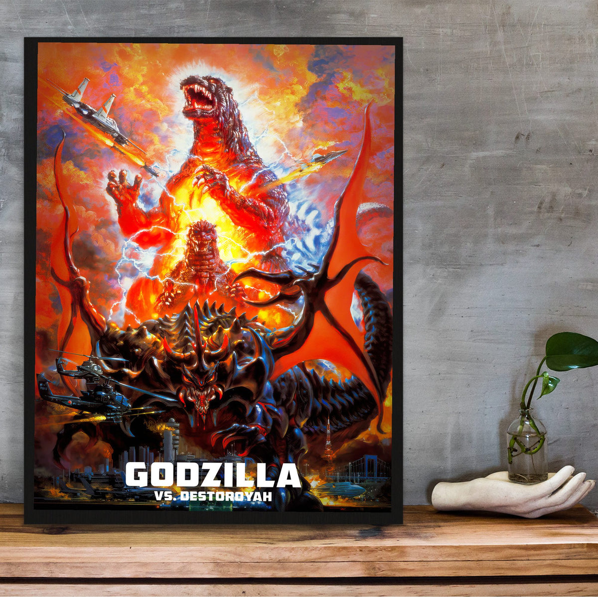Godzilla vs. Destoroyah (1995) Movie Key Art poster in a black frame on a wooden shelf against concrete