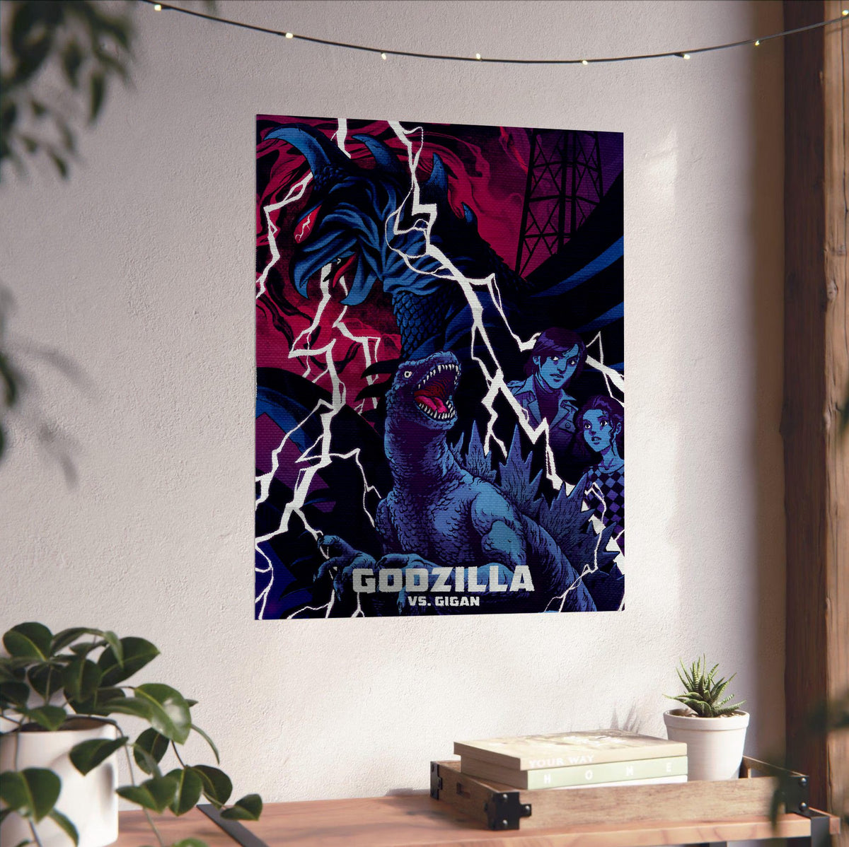 Godzilla vs. Gigan (1972) Movie Illustrated Art poster unframed on a white wall above a desk