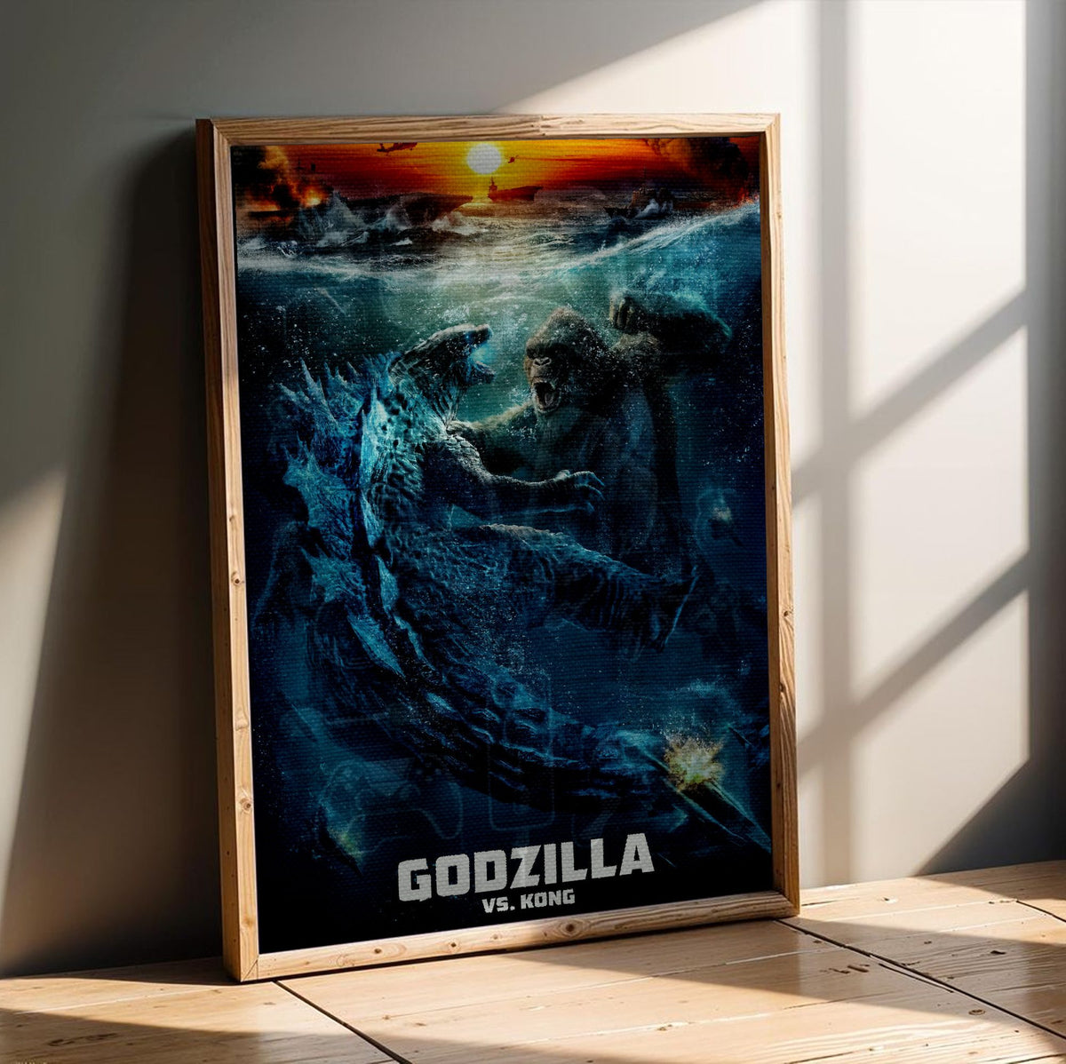 Godzilla vs. Kong (2021) Movie Ocean Battle Art poster in an oak frame leaning on a wooden floor