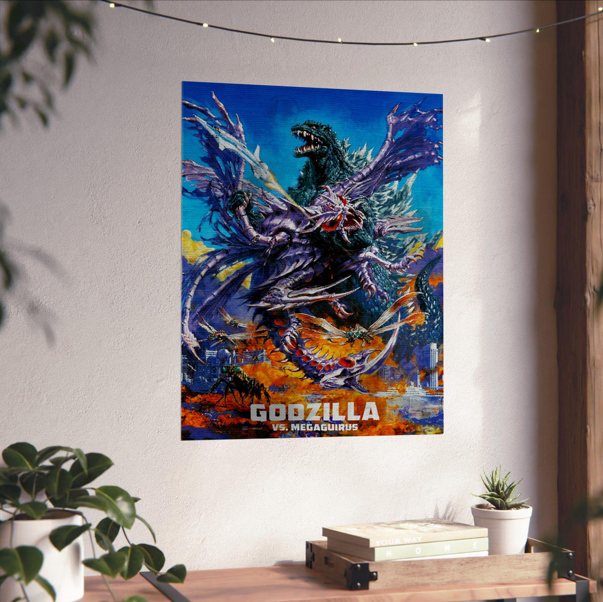 Godzilla vs. Megaguirus (2000) Movie Key Art poster unframed on a white wall above a desk