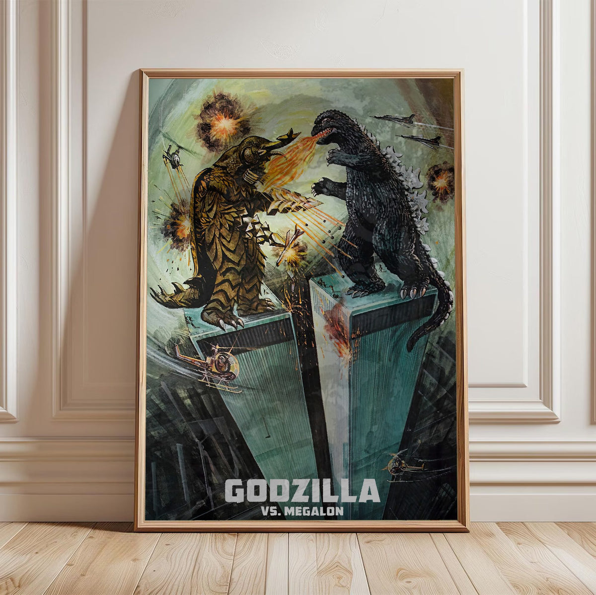 Godzilla vs. Megalon (1973) Movie Illustrated Art poster in a light oak frame leaning against a white wall