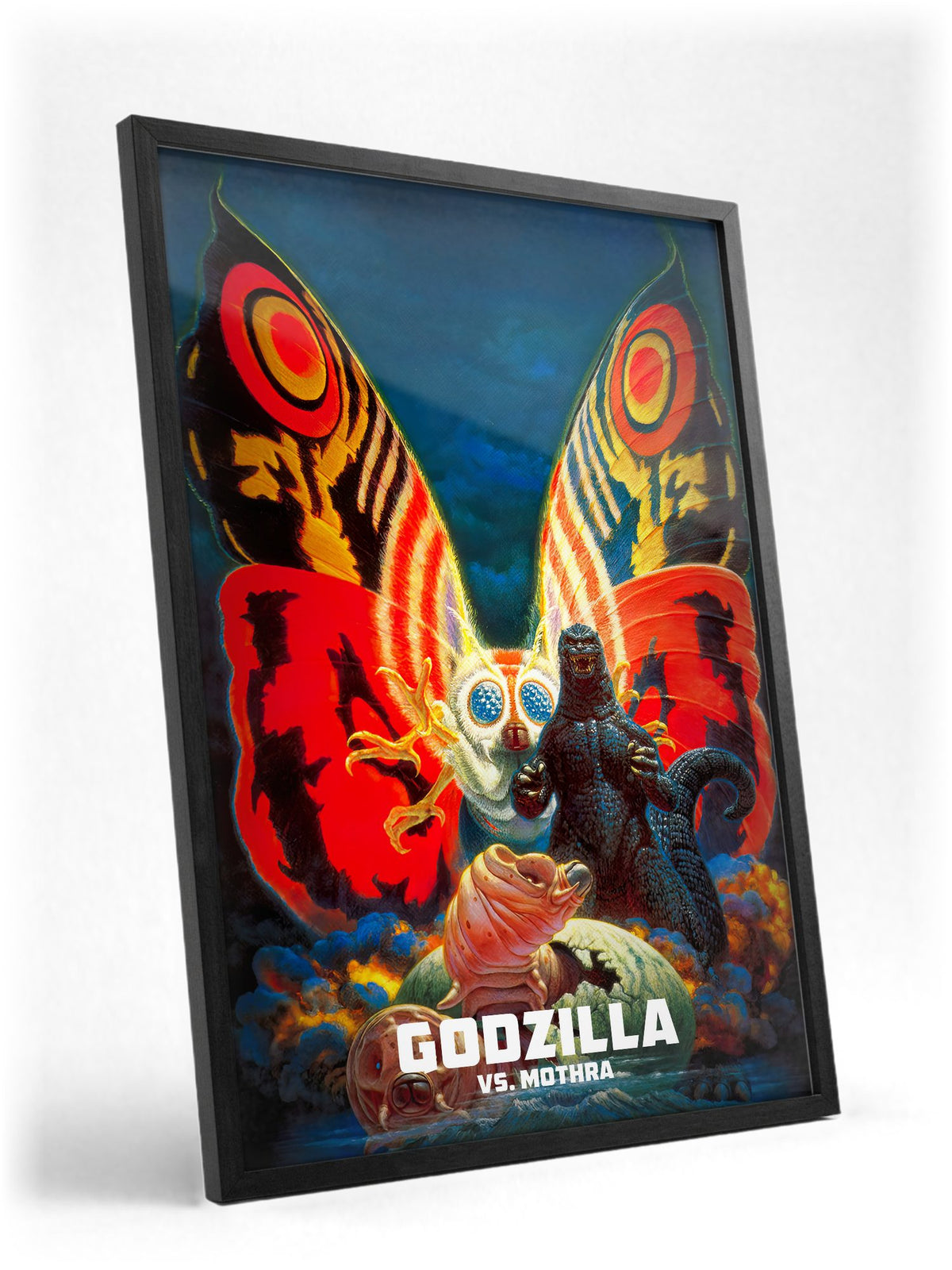 Godzilla vs. Mothra (1992) Movie Key Art poster in a black frame with glass leaning against a wall