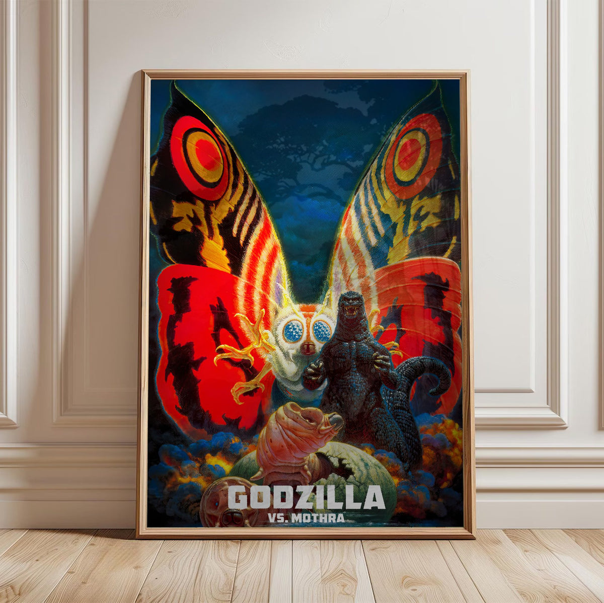 Godzilla vs. Mothra (1992) Movie Key Art poster in a light oak frame leaning against a white wall