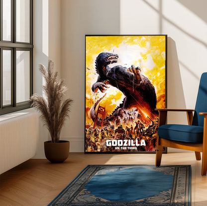 Godzilla vs. The Thing (1964) Movie Illustrated Art poster framed beside a blue armchair in a sunlit room