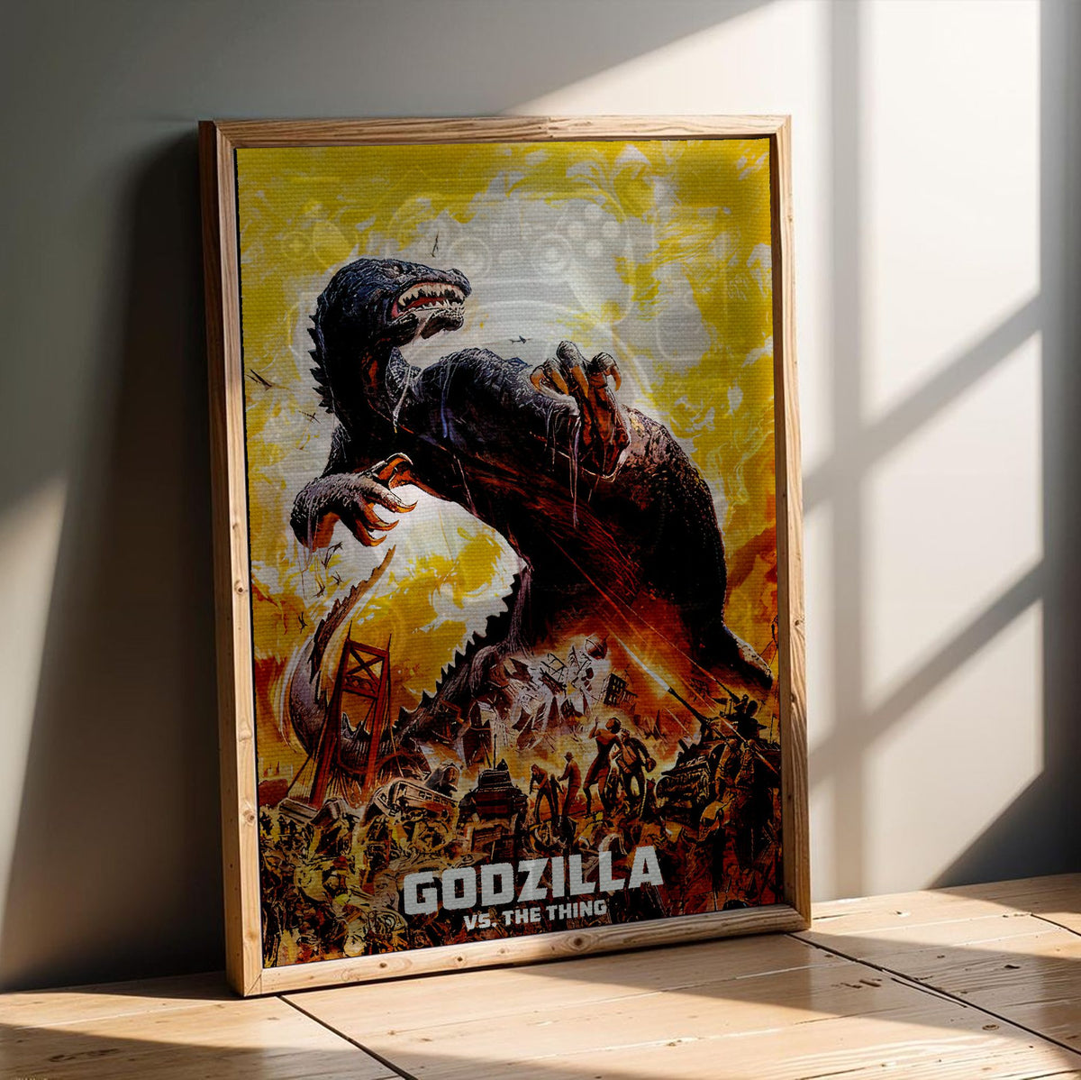 Godzilla vs. The Thing (1964) Movie Illustrated Art poster in an oak frame leaning on a wooden floor