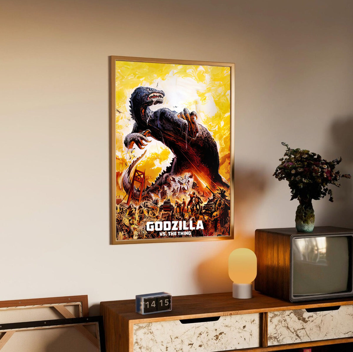 Godzilla vs. The Thing (1964) Movie Illustrated Art poster in an oak frame above a sideboard