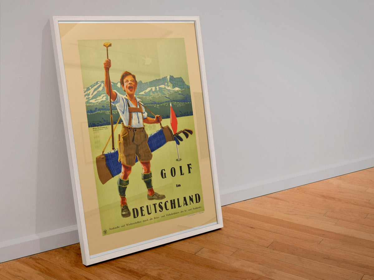 Golf in Deutschland poster in a white frame leaning against a wall