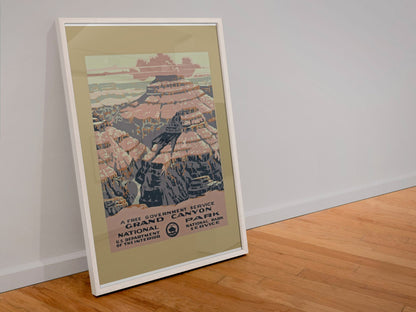 Grand Canyon National Park poster in a white frame leaning against a wall