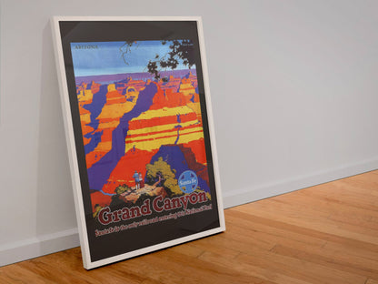 Grand Canyon Santa Fe poster in a white frame leaning against a wall