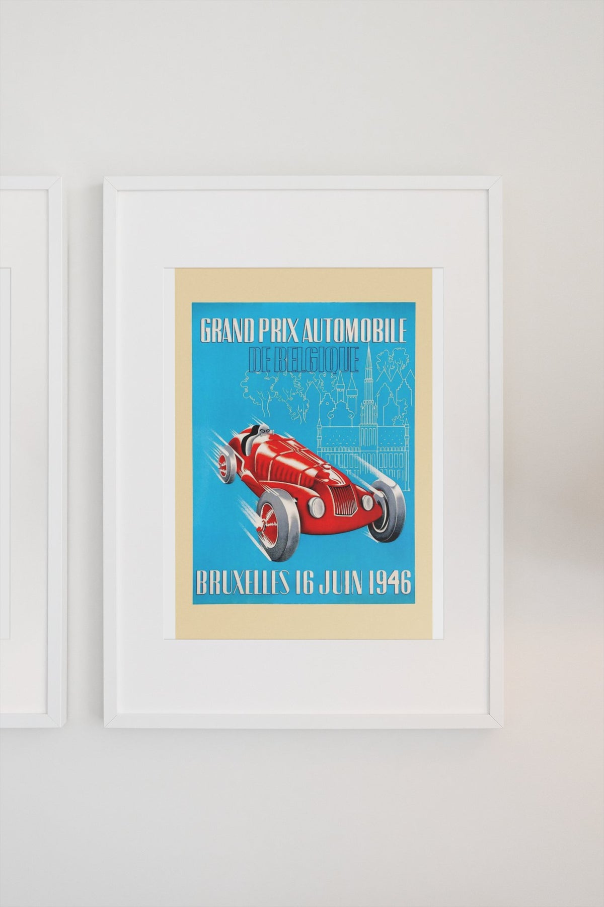 Grand Prix de Belgique Bruxelles 1946 poster in a white frame on a light wall