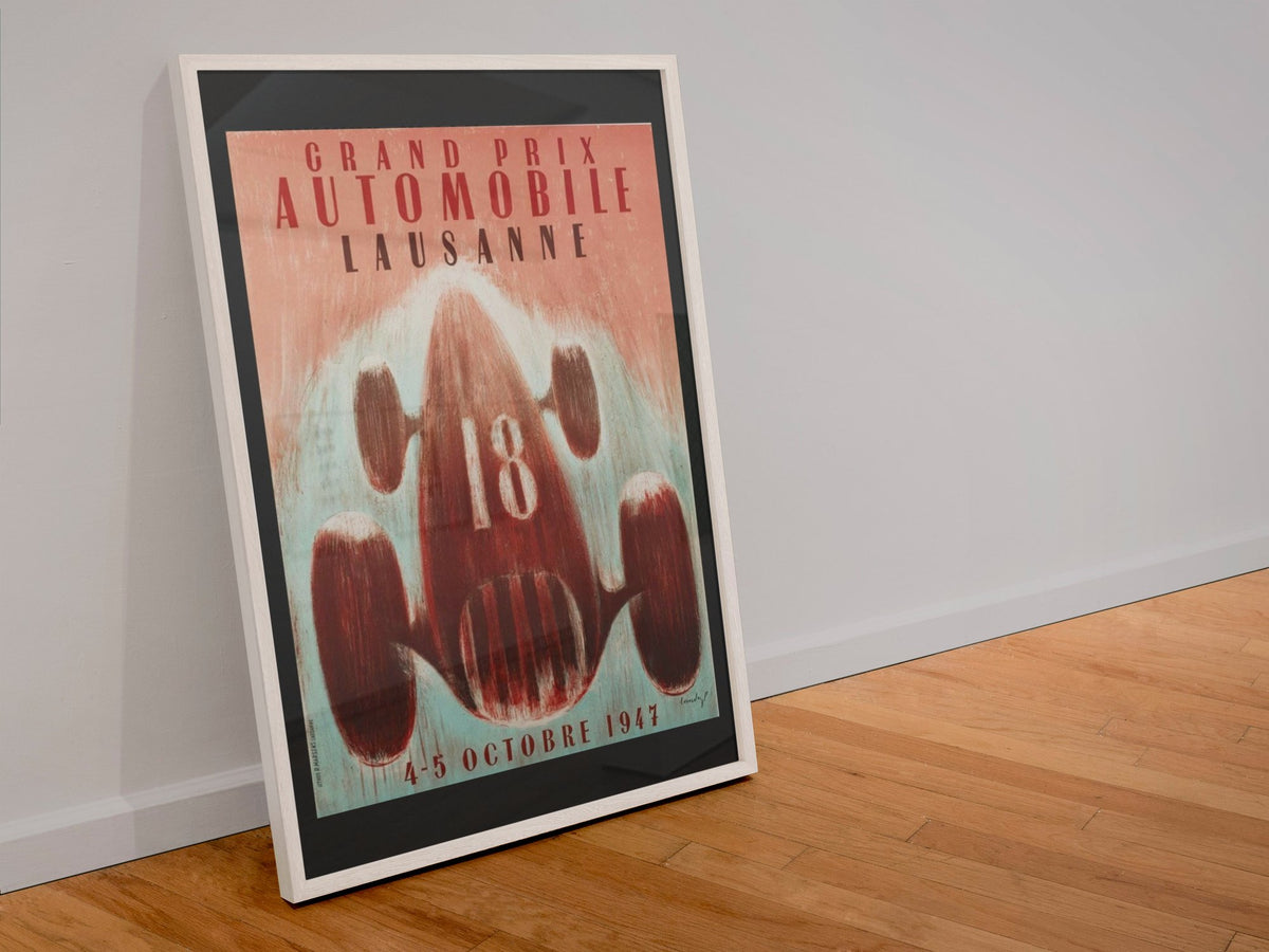 Grand Prix Lausanne 1947 poster in a white frame leaning against a wall