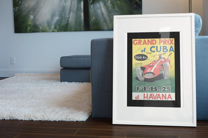 Grand Prix of Cuba Havana (Printed Signatures) poster in a white frame leaning beside a blue sofa