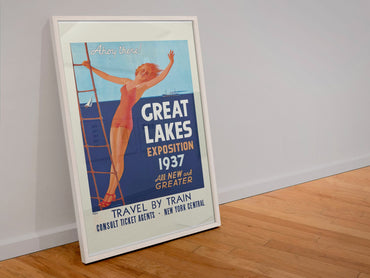 Great Lakes Exposition Cleveland 1937 poster in a white frame leaning against a wall