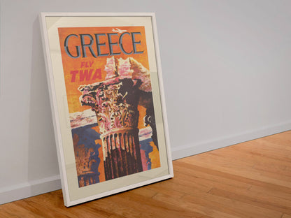 Greece Fly TWA 1960s poster in a white frame leaning against a wall