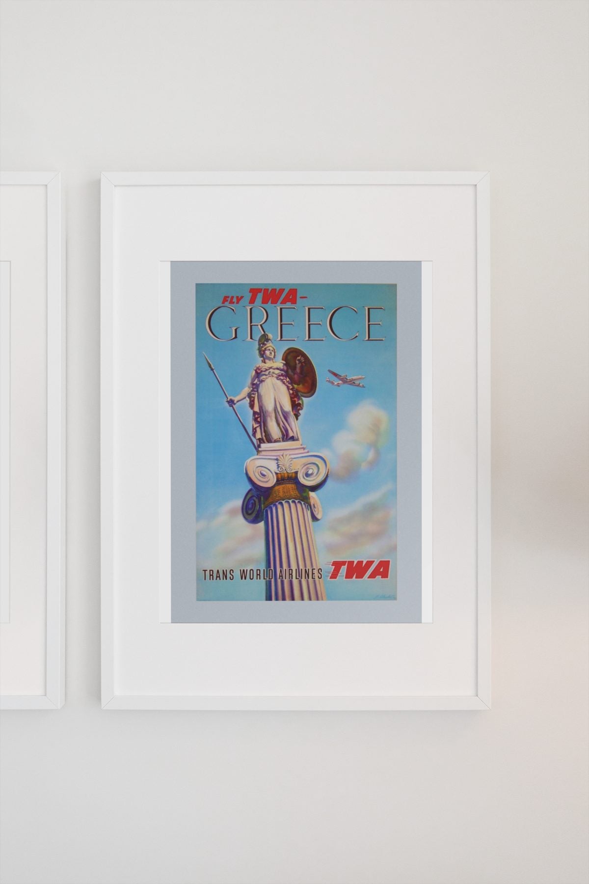 Greece Fly TWA 1955 poster on a light wall