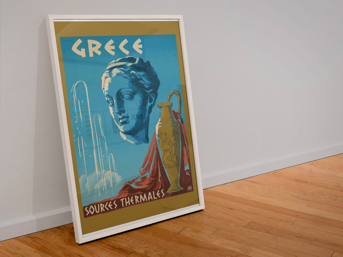 Greece Sources Thermales poster in a white frame leaning against a wall