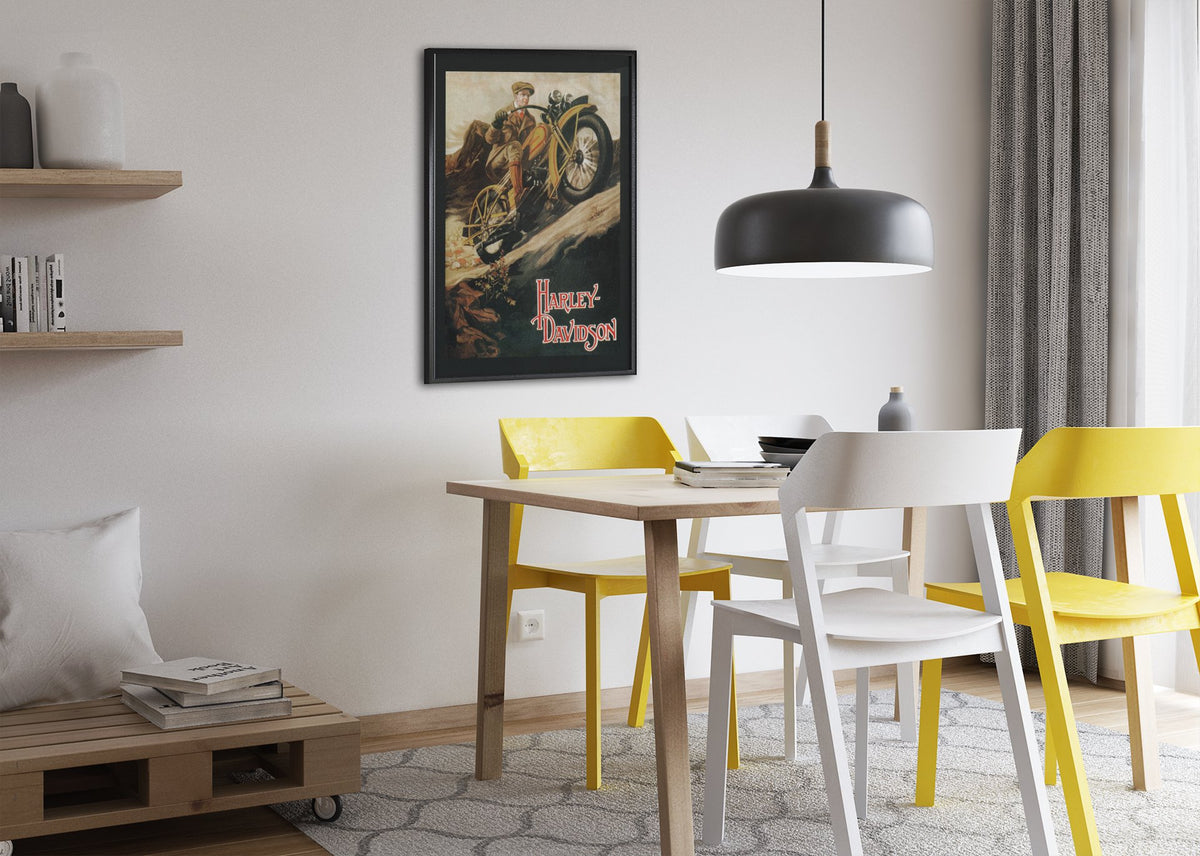 Harley-Davidson 1920s poster framed above a dining table