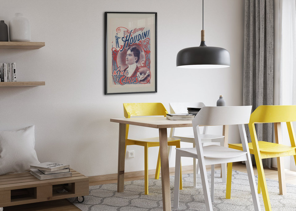 Harry Houdini King of Cards poster framed above a dining table