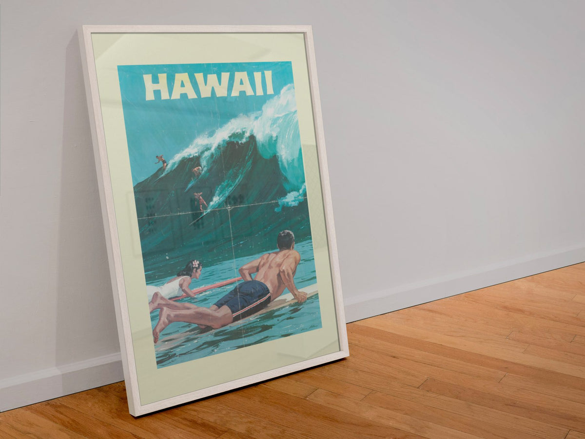 Hawaii Surfing poster in a white frame leaning against a wall
