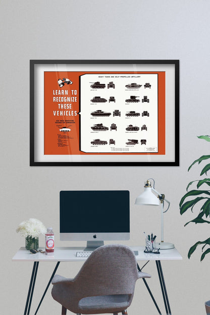Heavy Tank Recognition Chart poster framed on a grey wall above a desk