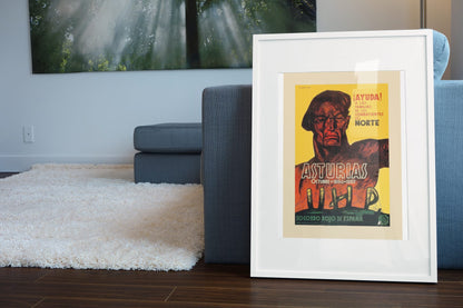 Help the Fighters of the North poster leaning beside a blue sofa