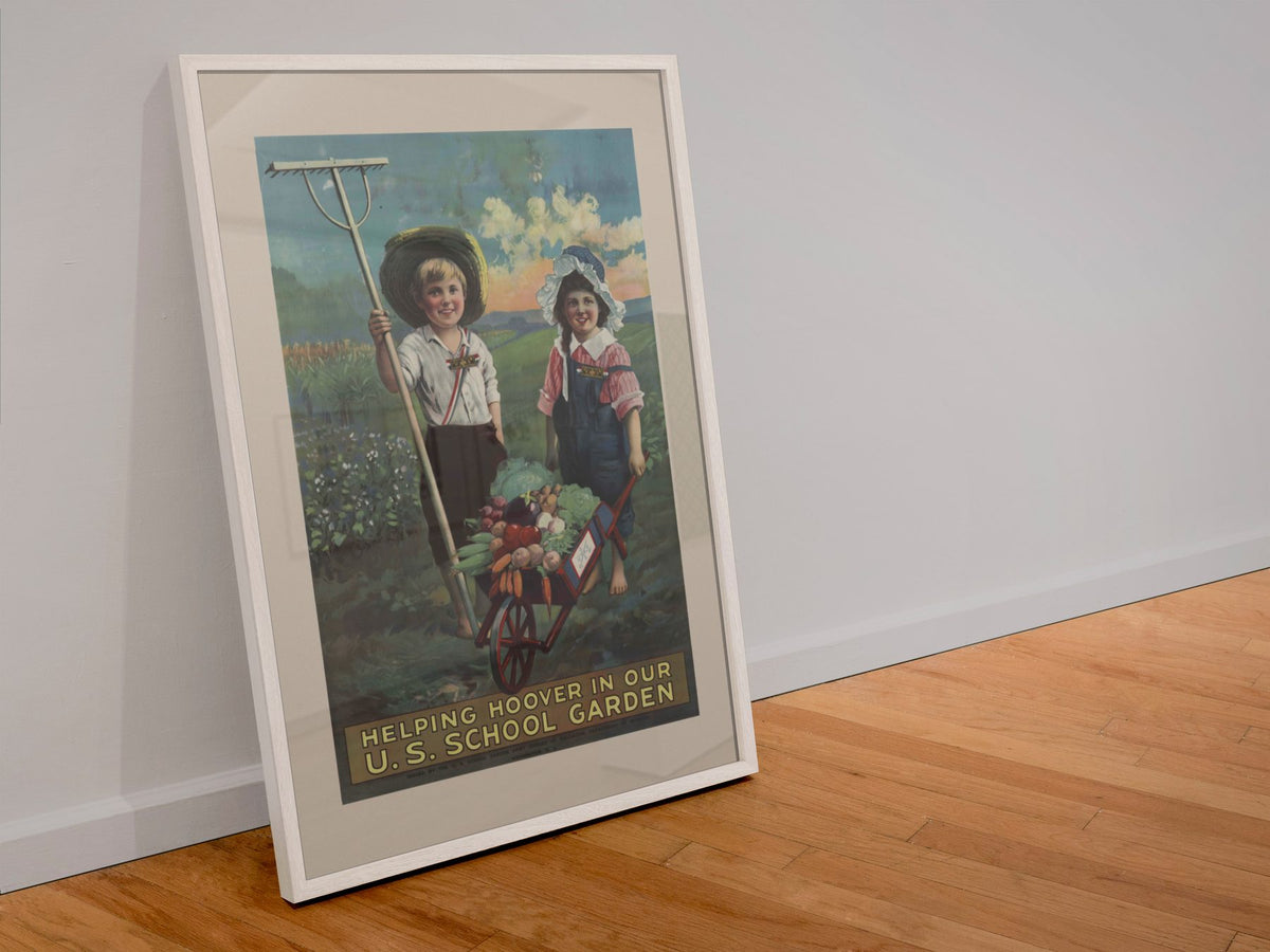 Helping Hoover in Our U.S. School Garden poster in a white frame leaning against a wall