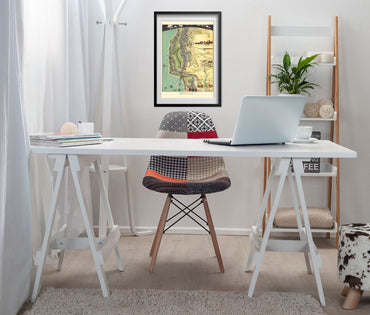Historical Events that Made Los Angeles Map print framed above a white desk in a home office