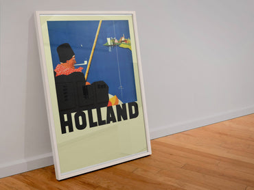 Holland poster in a white frame leaning against a wall