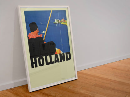 Holland poster in a white frame leaning against a wall