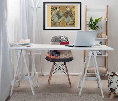 Homann World Map 1716 framed above a white desk in a home office