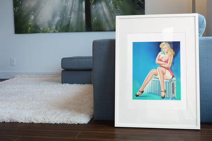 Hot Seat poster leaning beside a blue sofa