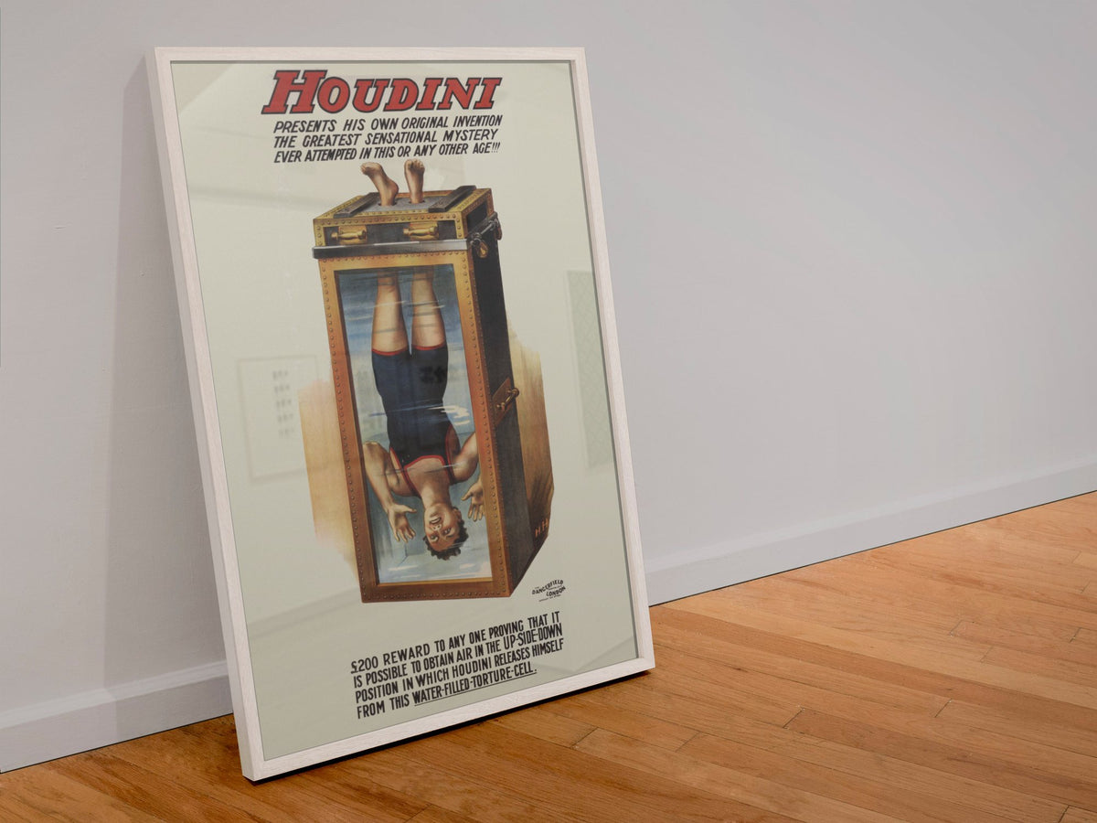 Houdini Chinese Water Torture Cell poster in a white frame leaning against a wall