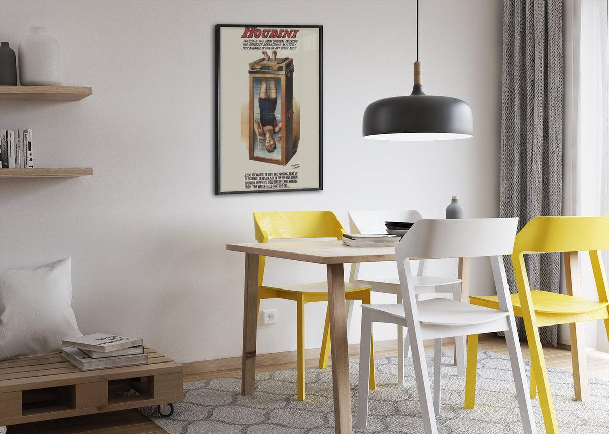 Houdini Chinese Water Torture Cell poster framed above a dining table