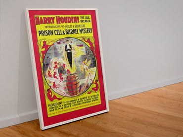 Houdini Prison Cell and Barrel Mystery poster in a white frame leaning against a wall