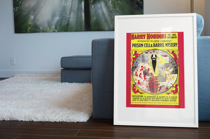 Houdini Prison Cell and Barrel Mystery poster leaning beside a blue sofa