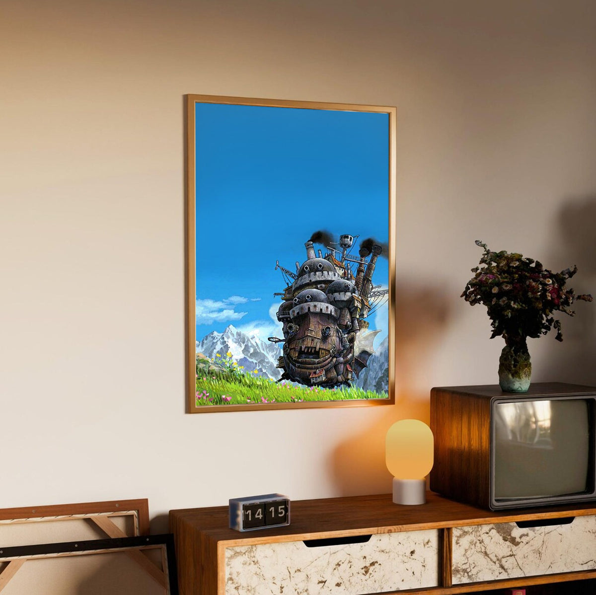 Howl's Moving Castle Triptych Panel Art poster in an oak frame above a sideboard