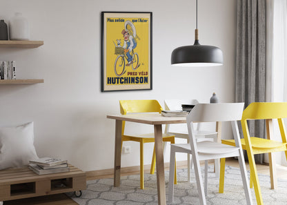 Hutchinson Pneu Velo poster framed above a dining table