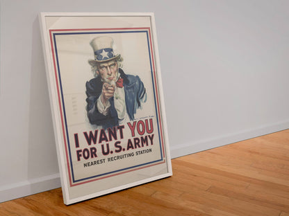 I Want You Uncle Sam poster in a white frame leaning against a wall