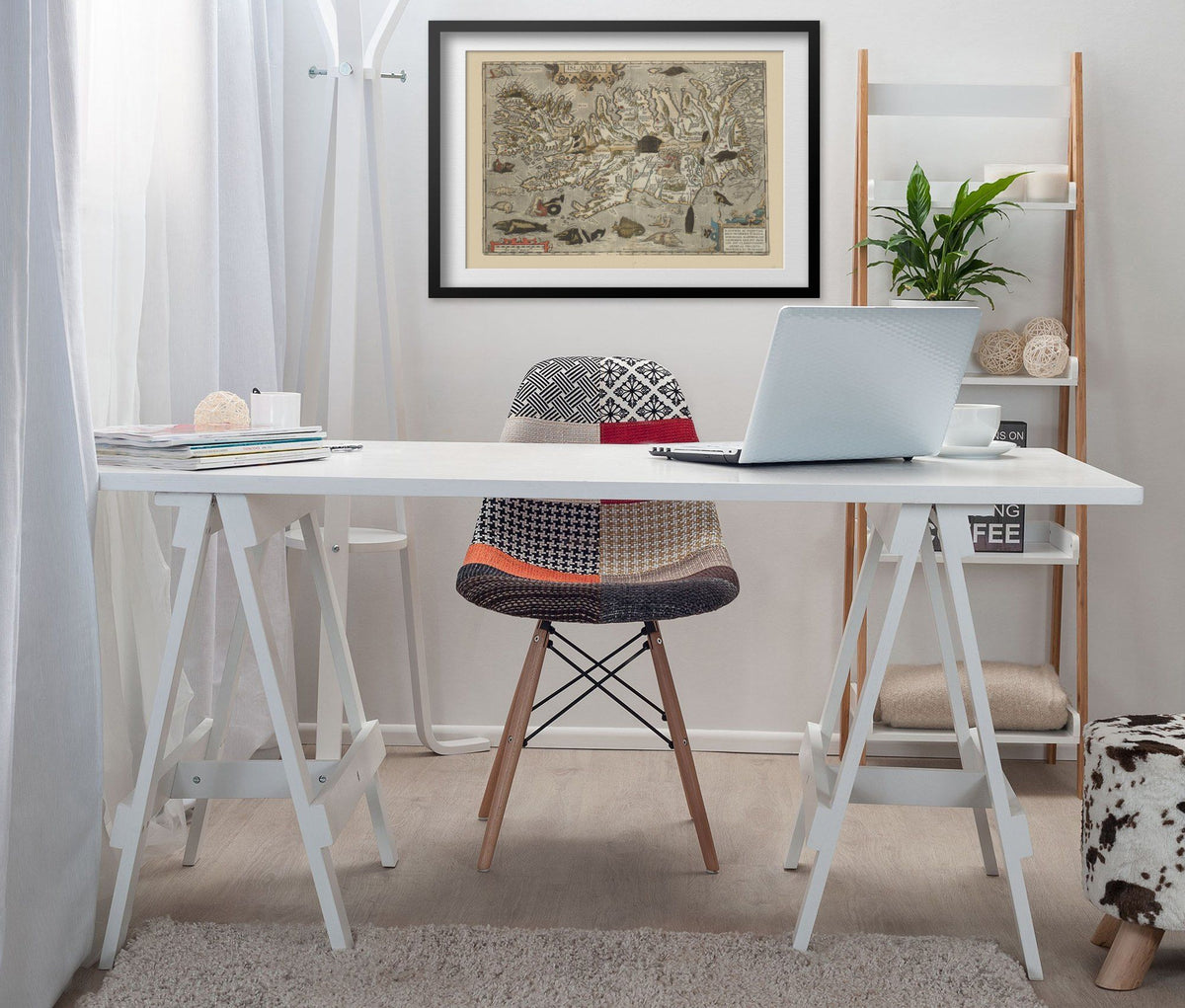 Iceland 1590 Map print framed above a white desk in a home office
