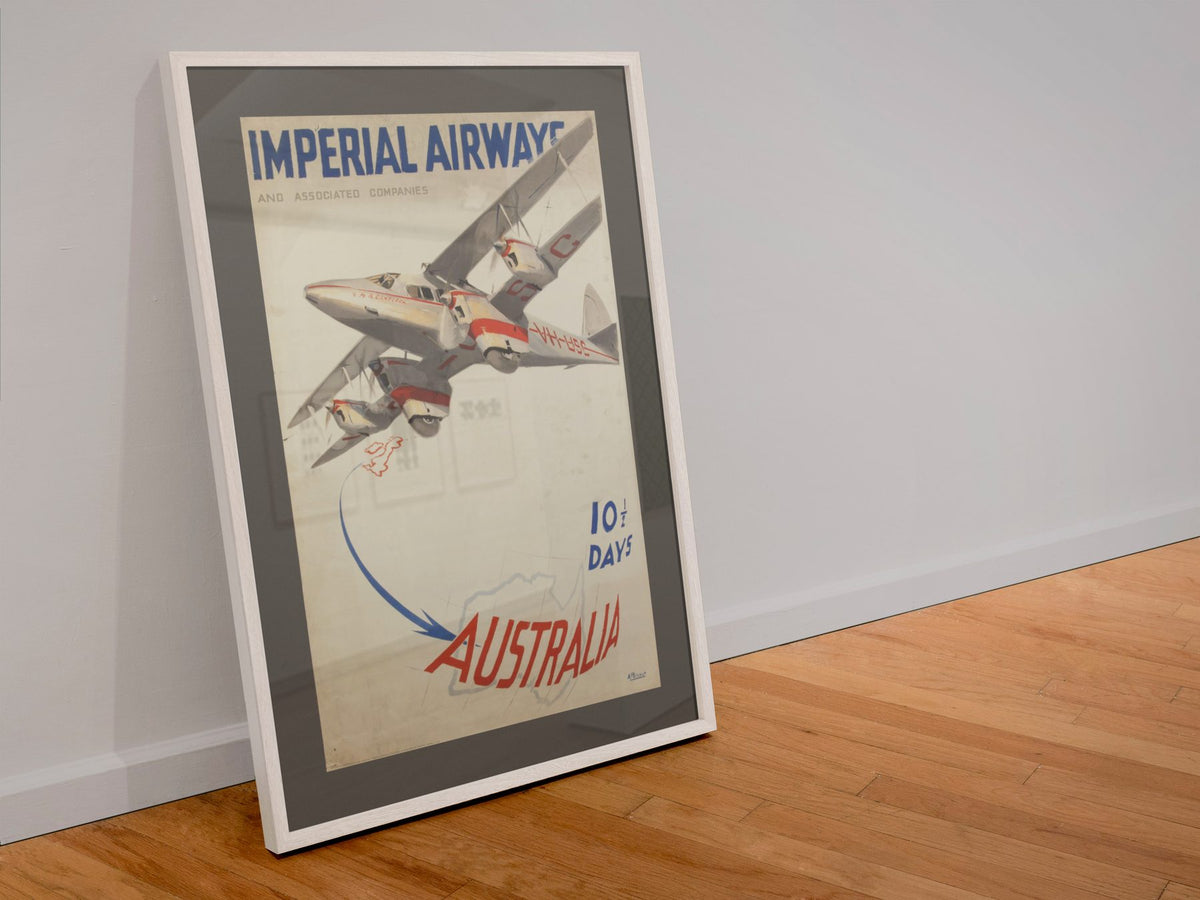 Imperial Airways Australia poster in a white frame leaning against a wall