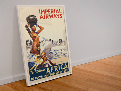 Imperial Airways Through Africa poster in a white frame leaning against a wall