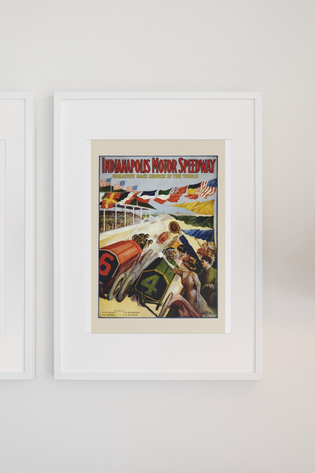 Indianapolis Motor Speedway poster in a white frame on a light wall