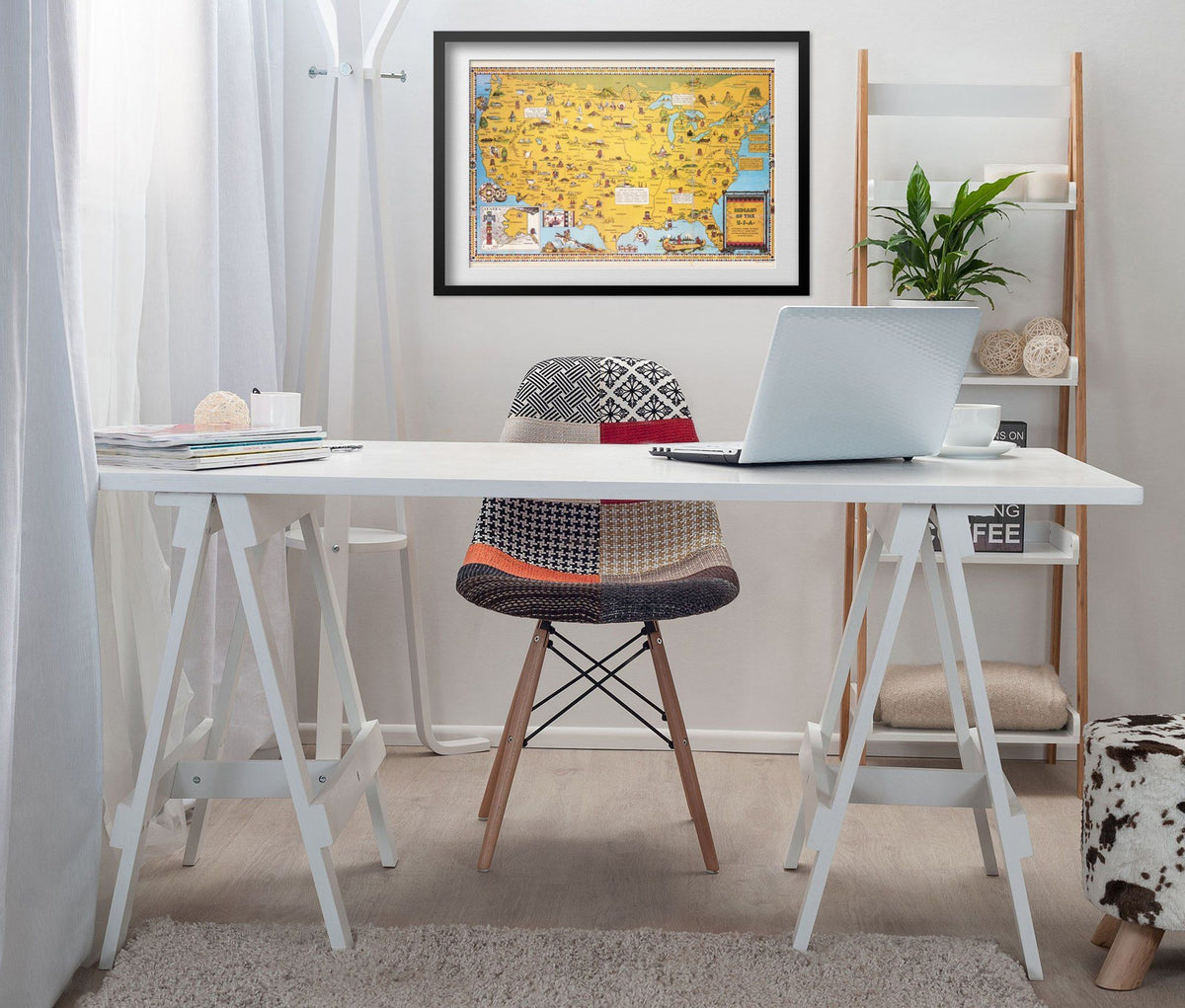 Indians of the USA Map print framed above a white desk in a home office