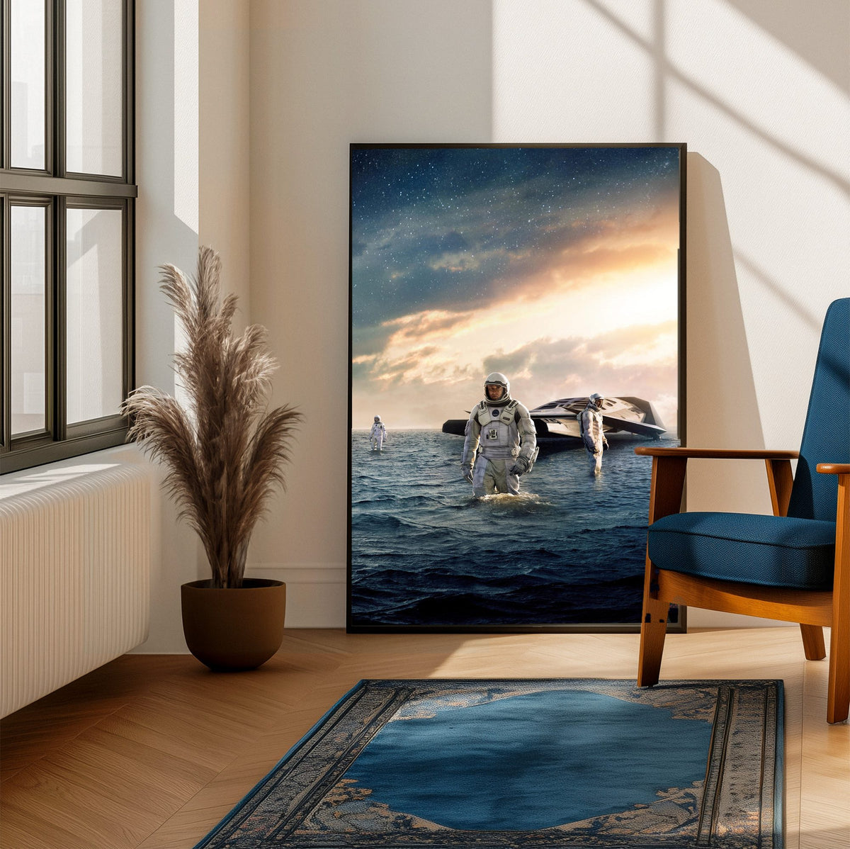Interstellar (2014) Movie Water Planet Art poster framed beside a blue armchair in a sunlit room