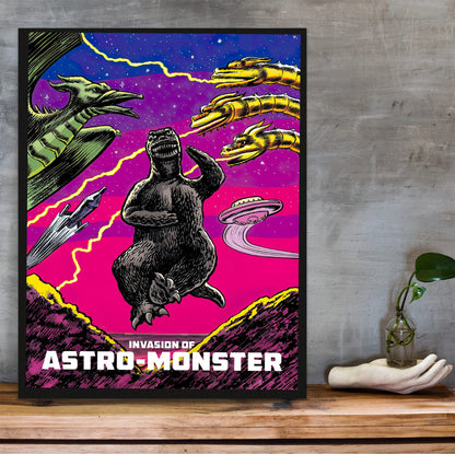 Invasion of Astro-Monster (1965) Movie Illustrated Art poster in a black frame on a wooden shelf against concrete