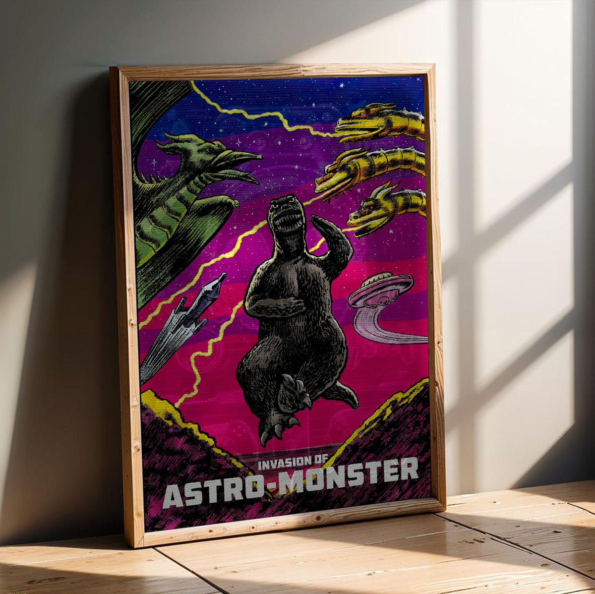 Invasion of Astro-Monster (1965) Movie Illustrated Art poster in an oak frame leaning on a wooden floor