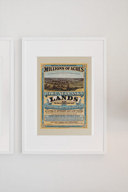 Iowa and Nebraska Lands for Sale poster on a light wall