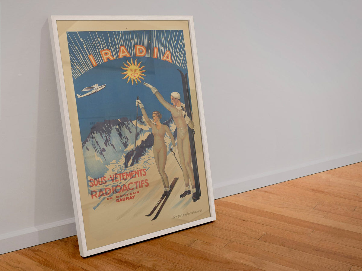 Iradia Radioactive Underwear poster in a white frame leaning against a wall