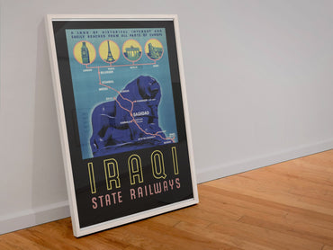 Iraqi State Railways poster in a white frame leaning against a wall